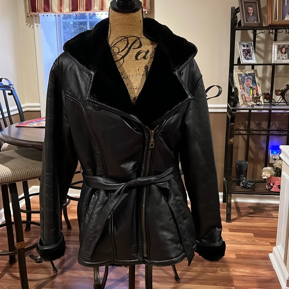 Size medium black heavyweight leather jacket with waist tie